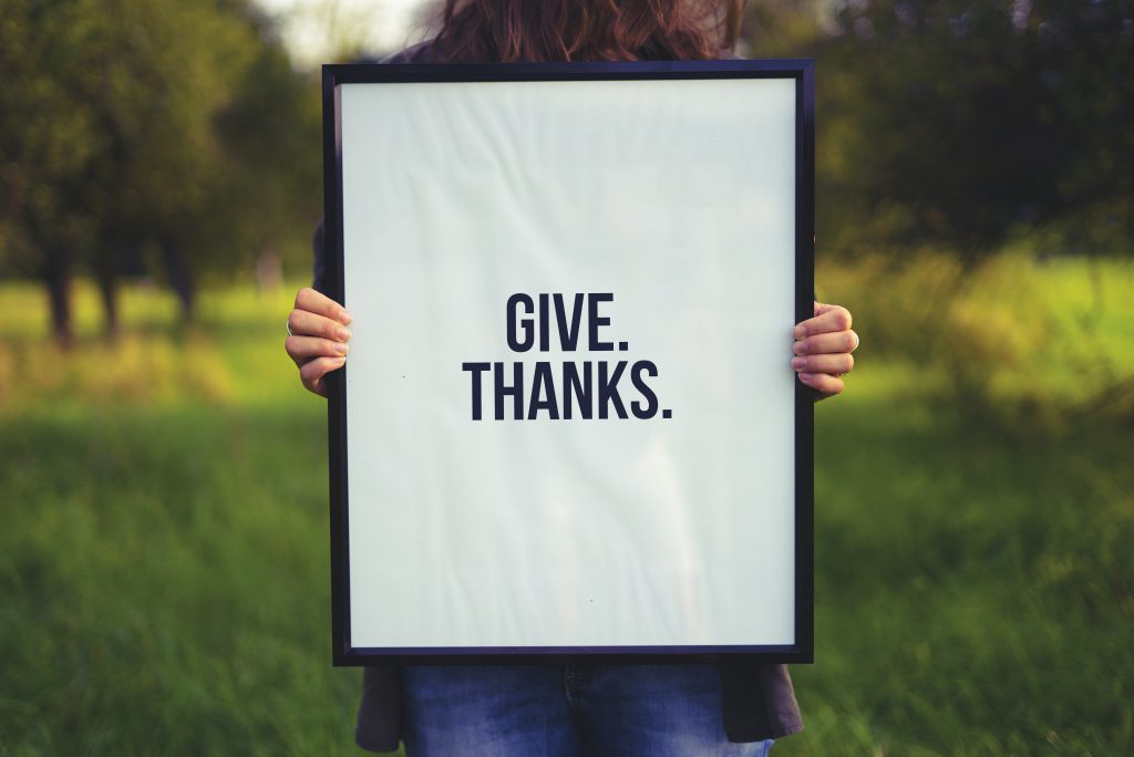 A board saying Give Thanks