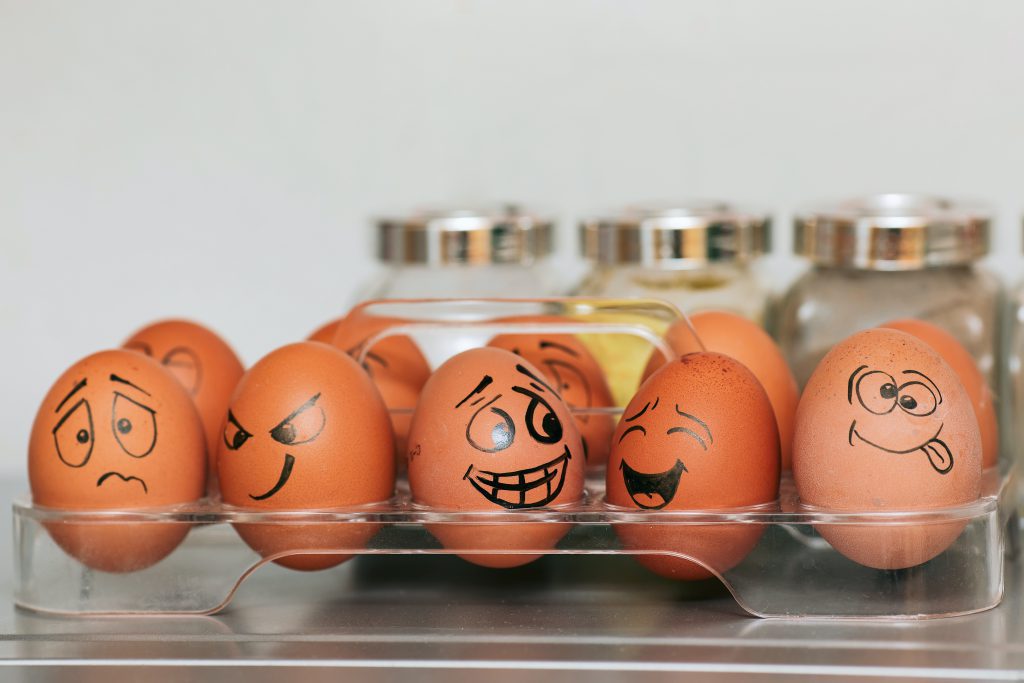 Painted eggs with different smileys