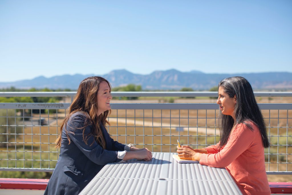 Two females discussing