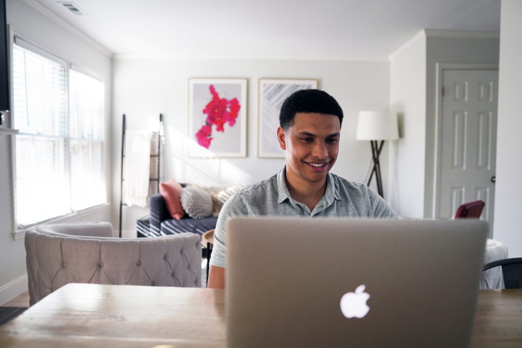 a person using a Mac laptop