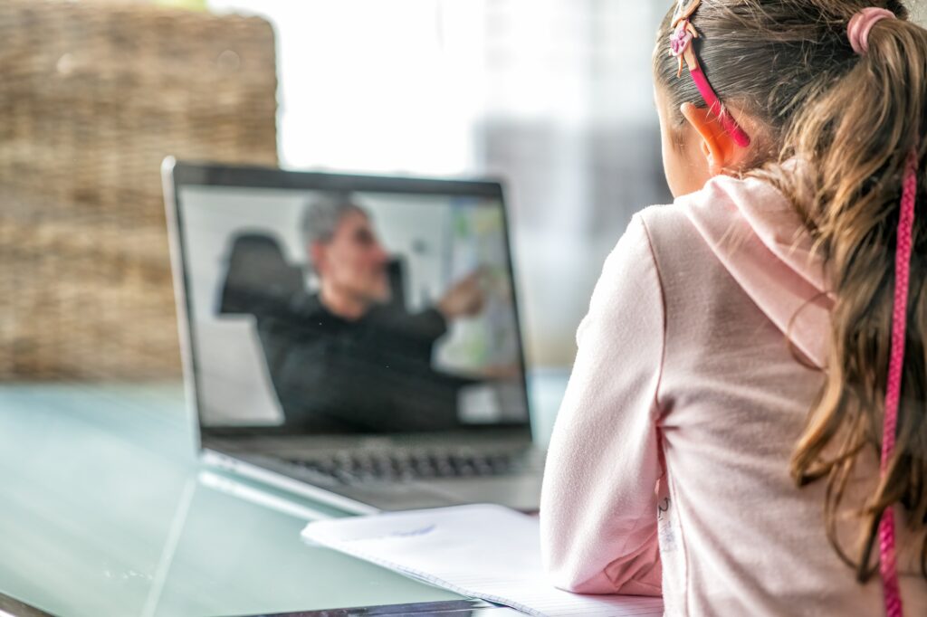 A student participates in virtual learning lessons