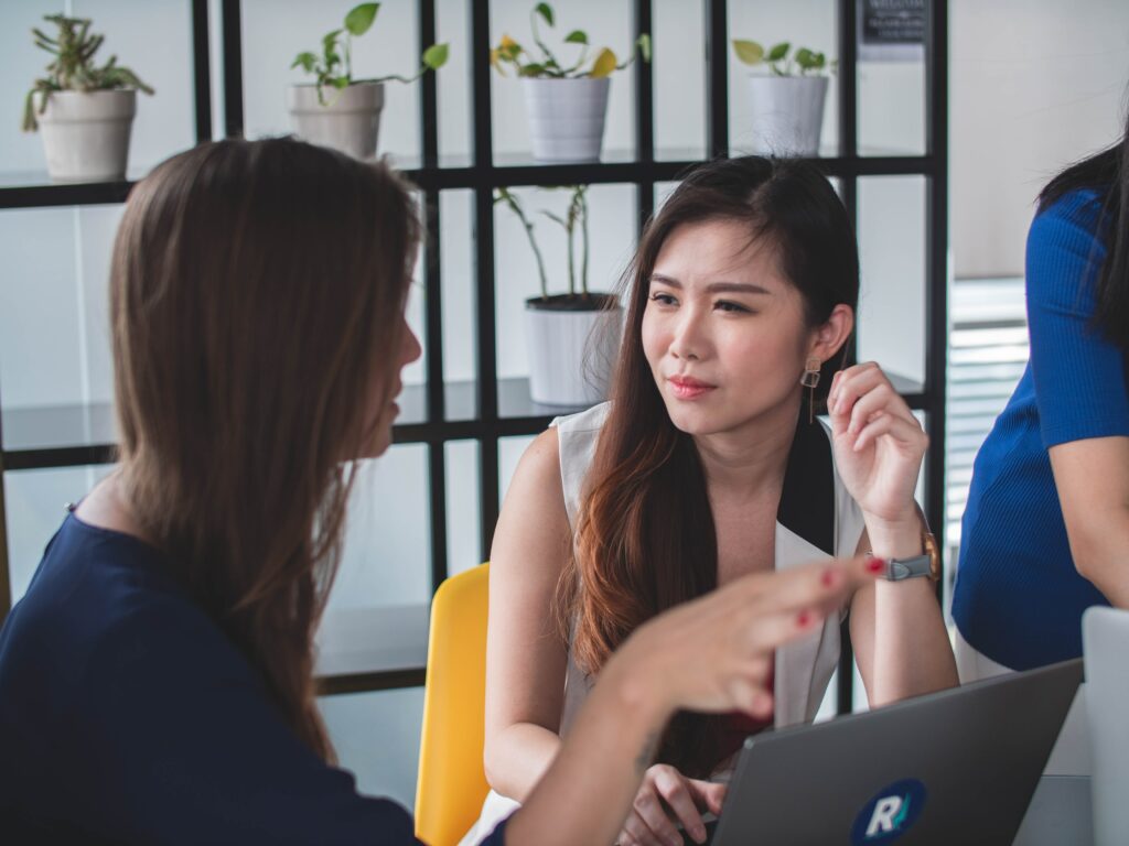 Two coworkers practice active listening