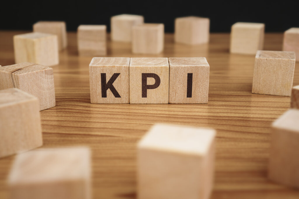 Wood blocks spelling out KPI, or key performance indicator