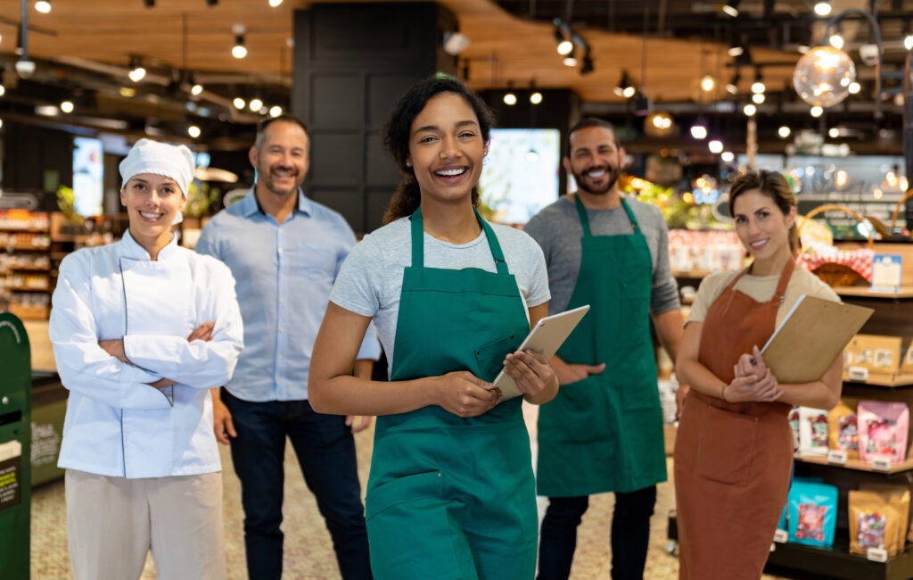 happy employees at store providing positive CX