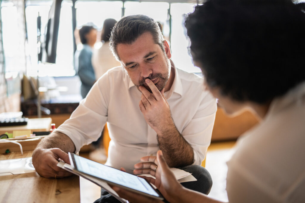 colleagues review data to avoid survey bias in analysis