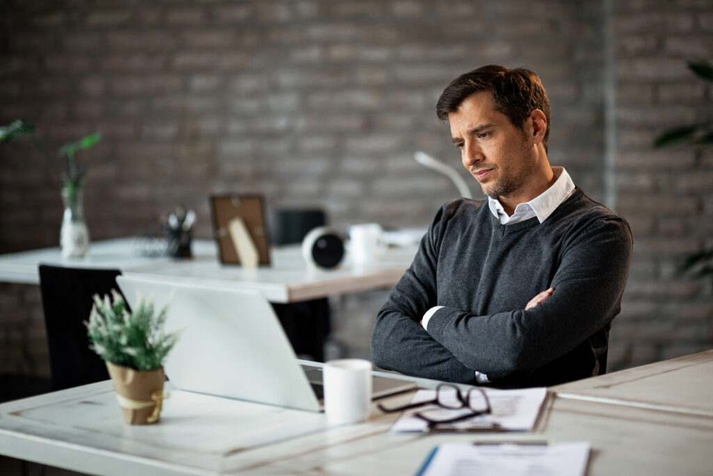 Team reviewing employee feedback reports during a workplace discussion about improvements.